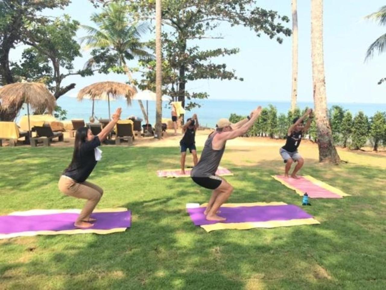 Eden Beach Khaolak Resort And Spa A Lopesan Collection Hotel - Sha Extra Plus Кхаулак Экстерьер фото A yoga class at a resort in Phuket, Thailand